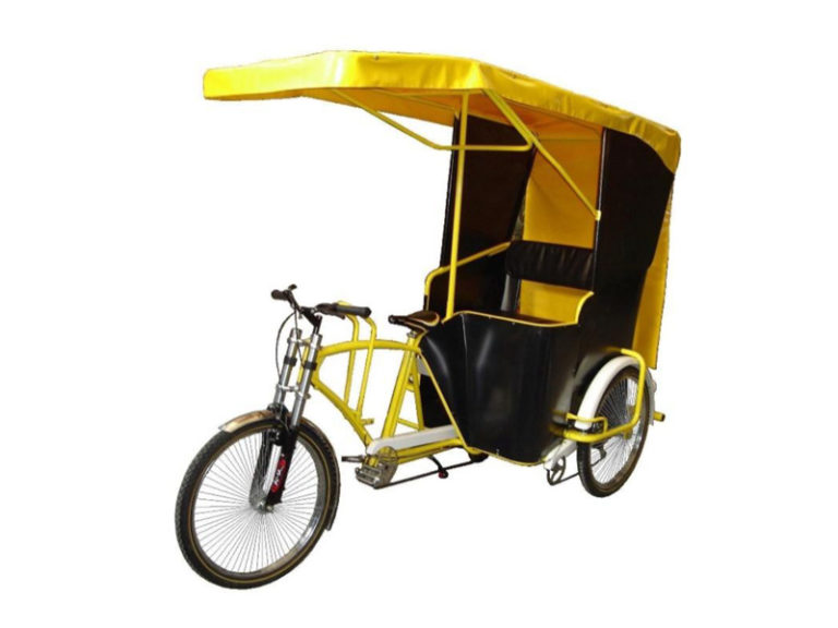 triciclo con toldo amarillo